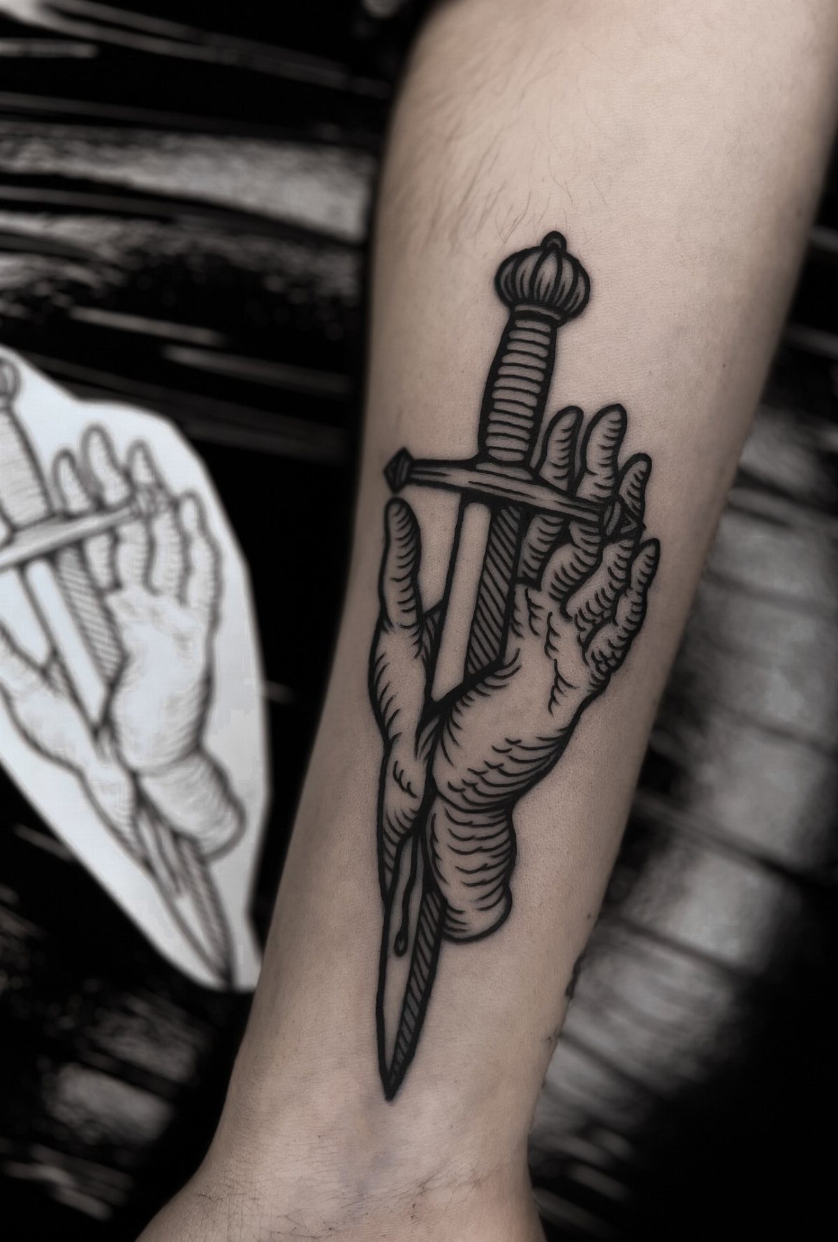 8 Cool Tattoos Ideas Drawing Sketches That Stay Interesting 6 Black ink tattoo of a decorative dagger held by two hands on a person's arm.