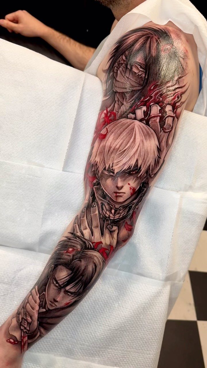 9 Tattoo Style Anime Ideas for Your First Ink or Next Sleeve 6 An anime character sleeve tattoo on a person's arm featuring dark shading and red highlights.